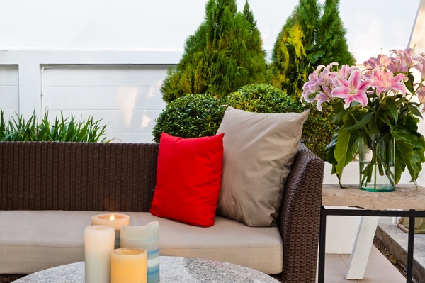 Outdoor patio seating area with candles