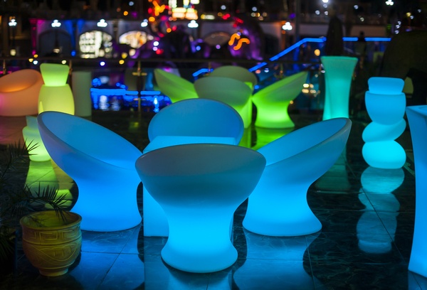 Modern garden furniture glowing at night